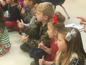 Children participate in singalong at Smithville Head Start Center Friday