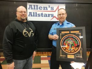 Chris Allen (left) presents the Allen’s Allstars “Git R Done” Award of the DeKalb County Volunteer Fire Department to Bill Brown of the Liberty Station during Saturday night’s annual awards dinner.