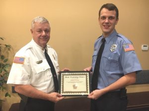 Smithville Volunteer Firefighter Jeff Prisock (right) was awarded Friday night for putting in the most training hours including LIVE Burn and Rookie School during 2019 at 204 hours. The award was presented by Fire Chief Charlie Parker