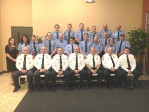 Members of the Smithville Volunteer Fire Department: Seated left to right: Lieutenant Kevin Adcock- 21 years, Lieutenant Danny Poss-40 years, Lieutenant Donnie Cantrell-40 years, Captain Jeff Wright-35 years, Chief Charlie Parker-40 years, Deputy Chief Hoyte Hale-35 years, and Lieutenant John Poss-30 years; Second Row: left to right- Kayla Williams-Photographer/Auxiliary 1 year, Brenda Soto-Rookie 2 years, Dillon Hicks-Rookie 2 years, Shawn Jacobs- Auxiliary 7 years, Dalton Roberts-6 years, Gary Johnson-15 years, Kim Johnson-4 years, Seth Wright-4 years, Ryan Herron: 4 years, Shannon Smith-1 year, Stephanee Wright-14 years, and Cory Killian-9 years; Back Row: left to right- Andrew Cooper-Rookie 1 year, Jeff Prisock-1 year, Glen Lattimore-12 years, C.J. Tramel- 6 years, Bradley Johnson- 6 years, and William (Wink) Brown-22 years