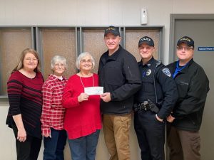 Almost $700 was raised by the Smithville Police Department through the “No Shave November” campaign. No-Shave November is a nationwide fundraiser for cancer awareness. This year’s observance was in memory of the late Margaret Judkins, mother of Smithville Police Officer Will Judkins and all proceeds went to the American Cancer Society. Chief Mark Collins presented the check for $680 Friday to Iva Dell Randolph. Pictured left to right: Marlene Delong, Community Representative for the American Cancer Society, Gail Taylor, Iva Dell Randolph, Chief Mark Collins, Officer Will Judkins, and Captain Steven Leffew