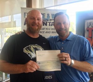 The DCHS Tigerette Softball Program received a check today (Tuesday) from Florence & White Ford of Smithville in the amount $6,000. The check was presented to DCHS Softball Coach Danny Fish by Jimmy White of Florence & White Ford. The funds were raised in a Ford Test Drive Event held in March.