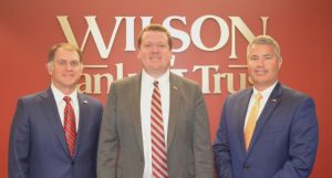 Wes Taylor, center, has been promoted to senior vice president of consumer and small business lending at Wilson Bank & Trust. Taylor, who also continues to serve as a regional president at WB&T, was welcomed to his new position by CEO John McDearman, left, and President John Foster.