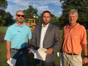 Mike Boyce, co-owner of Boyce Ballard Construction Company of Murfreesboro, the contractor for the Smithville Police Department construction project (left), Smithville Mayor Josh Miller (center), and Wayne Oakley, owner of Studio Oakley Architects, LLC of Lebanon, the architect for the project (right)