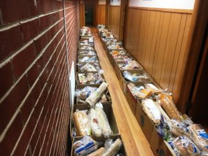 Food boxes lined the hallway at Snow Hill Baptist Church Sunday to be distributed during a drive thru pickup