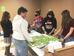 DeKalb West Beta students wrapping gifts during Saturday's Regifting Event