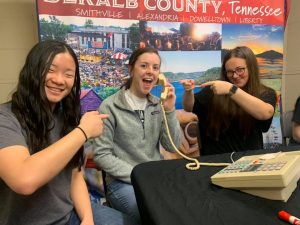 2021 DCHS Seniors Hannah Willingham (Left) and Alexis Atnip (Right) point to Carly Vance during WJLE radiothon for the DCHS Class of 2021 Project Graduation