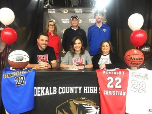 DCHS Junior Lady Tiger Basketball talent Kennedy Agee signed a letter of intent at DCHS to play for the Kentucky Christian University Lady Knights starting with the 2022-23 season. Pictured with Kennedy (center) are her parents Josh and January Agee. Standing left to right are KCU head coach Lisa Conn, and Kennedy’s AAU Coaches Mike Johnson and Matt Ferrell, Program Director for Tennessee Rush based in Cookeville