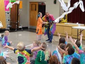 Smithville Elementary Celebrates Fun Day. Chazon King assisting the Science Guy.