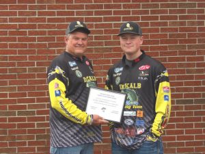 DeKalb Fishing Team President Jeff Taylor on Saturday, May 8 presented Senior Cole Wright with a $250.00 fishing scholarship.