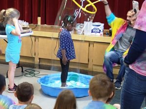 Smithville Elementary Fun Day. Destiny Earlington in a giant bubble