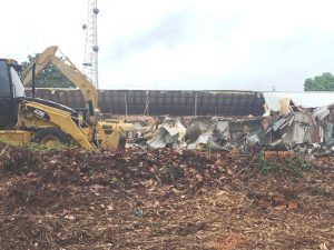 Demolition began Monday on the 11,000 square foot facility once known as Knowles Hospital which stood for decades situated on 1.25 acres overlooking Broad Street.