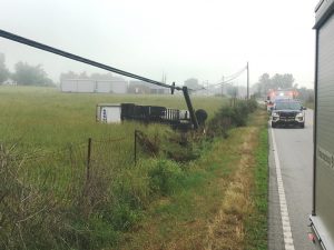 A 61 year old truck driver escaped injury this morning (Friday) in a rollover crash on Highway 146 near the Mt Pisgah Free Will Baptist Church