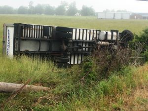 Billy Branam of Chattanooga was driving north on Highway 146 in a 2019 International Box Truck hauling produce when he ran off the right side of the roadway and overcorrected. The truck then came back across the highway and went off the left side before plowing through a fence and hitting a utility pole. The truck then overturned and came to rest on its side in a field.