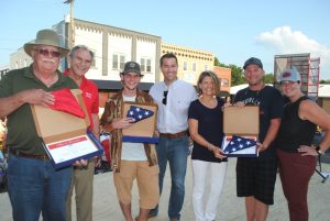 During the opening ceremony, DeKalb County’s state lawmakers presented flags flown over the state capitol to Jamboree visitors who traveled the longest distances to get here. State Senator Mark Pody presented a Tennessee State Flag to James Hayes from Memphis. Sara Nolte and Gregory Cecil of California received a state flag from Representative Terri Lynn Weaver while State Representative Clark Boyd gave a United States flag to Gunnar Salyer of Mozambique, East Africa. Pictured left to right: Hayes, Pody, Salyer, Boyd, Weaver, Cecil, and Nolte