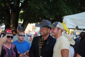 Jamie Dailey of Dailey & Vincent poses for pictures after Saturday's performance at the Fiddlers' Jamboree