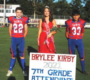 7th grade DeKalb Middle School attendant Brylee Kirby. She was escorted by Devin Fish (left) and Kaleb Gomez (right)