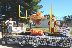 DCHS Homecoming Parade: Second place went to the Sophomore Class float with the theme “Save a Tiger Roast a Lion”