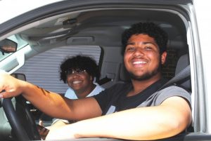 Brayden Tubbs and Amarious Shaw received third place in a white Chevy Silverado