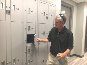 Wayne Oakley of Studio Oakley Architects, LLC of Lebanon who designed the new Smithville Police Department building pictured here at the evidence lockers during open house Sunday