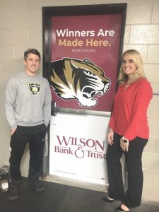 Wilson Bank & Trust Helps DCHS Athletic Programs Beef Up Their Weight Room. Tiger Basketball Coach John Sanders pictured with Kalah Donnell of WB&T