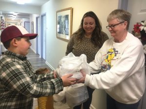 Levi, Addi Kate, and Jessica Nixon delivered a Thanksgiving Day meal Thursday to Frances Mahler, a resident at Fiddlers Manor Apartments on behalf of the DeKalb Emergency Services Association. The Nixon’s were joined by Hannah Ball and Walker Pulley not pictured here