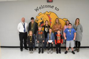 DeKalb West School has announced its Students of the Month for December: Pictured front row left to right are Calla Vickers, Kyson Gray, Claire Cripps, Dylan Bates, and Zane Griffith. Back row left to right are Assistant Principal Joey Agee, Carter Vickers, Averly Moss, Raegan Murphy, Kate Pistole, and Principal Sabrina Farler. Not Pictured Lileigh Smith.