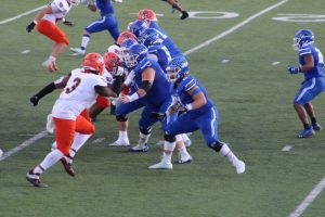 #61 Eli Cross in action for Lindsey Wilson