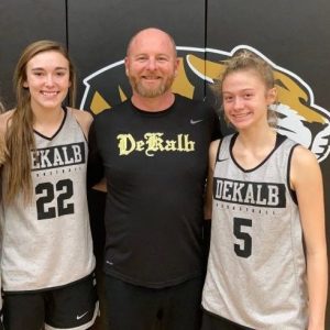 Lady Tiger Ella VanVranken (right) made a shot at the buzzer to give DeKalb County a 57 to 56 win over the Gallatin Green Wave in the AFLAC Shootout at Watertown Wednesday. Kadee Ferrell (left) scored 28 points in the victory. Meanwhile the Tigers (7-5) defeated the Community Vikings 52 to 49 in their Watertown tournament game.