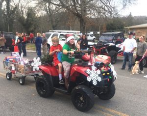 In the entry for small kids, Alexis Reynolds took 1st place at the Liberty Christmas Parade