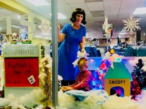 Chamber Announces Christmas on the Square “Live Window” Display Winners: Third Place went to Savvy Scrubs who won with the help of Charlie Brown characters including Lucy offering 5-cent advice from her psychiatric booth.