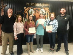 DeKalb County High School continued its monthly observance Friday of recognizing a teacher, student, and parent or guardian of the month: Pictured here left to right Principal Bruce Curtis, Assistant Principal Jenny Norris, Parent of the Month Essay Winner Kristen Lynch, Student of the Month Christina Youngblood, Teacher of the Month Lesa Hayes and Assistant Principal Thomas Cagle