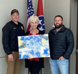 Smithville Police Chief Mark Collins, Chamber Director Suzanne Williams, Smithville Mayor Josh Miller