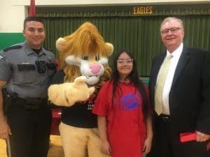 One hundred seventy six fifth graders at Northside Elementary School graduated from the D.A.R.E. (Drug Abuse Resistance Education) program in a ceremony Wednesday afternoon. D.A.RE Officer Joseph Carroll of the DeKalb County Sheriff’s Department (pictured left) was the moderator of the program. The overall D.A.R.E. essay winner was Edith Granados (pictured here beside D.A.R.E. Mascot DAREN the Lion) who received gifts and a $50 check from General Sessions and Juvenile Court Judge Bratten Cook, II (pictured right)