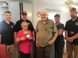 On Saturday the American Red Cross and the DeKalb County Volunteer Fire Department teamed up for a “Smoke Alarm Blitz”. Teams fanned out across the county to install smoke alarms at 130 addresses including at the home of Clay and Sharon Farler on South College Street, Smithville. Pictured here with Mr. and Mrs. Farler are Luke Green (DCFD), DCFD Chief Donny Green, Cindy Pankowski (American Red Cross Volunteer) and Blake Reffue (DCFD)