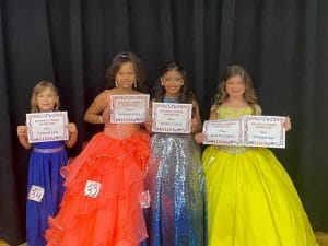 Miss Jamboree in the 7-10 year old age group: 8 year old Katy Jo Bowen (far right) is the Miss Jamboree Queen in the 7-10 year old age group. Katy was also awarded for Most Photogenic and Prettiest Hair. She is the daughter of the late Joseph Bowen and Cody and Kimberly Atnip of Liberty. Third place went to 9 year old Arraya Jenae Taylor (second from left) of Smithville, daughter of Angie Taylor. She was also judged to have the Prettiest Attire. Raelyn Snider (far left), 7 year old daughter of Chelsey and Kirk Snider of Smithville was awarded for Prettiest Eyes while Emilet Aldino (second from right), 8 year old daughter of Cecilia Aldino of Smithville received the People’s Choice Award.