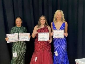 Alexis Grace Atnip (left), daughter of Veronica and Gary Johnson of Smithville, was crowned the 2022 Miss Jamboree in the age 17-20 category Saturday at the county complex auditorium and was awarded for Prettiest Hair and Eyes. 17-year-old McKenzie Faith Sanders (center) was judged to have the Prettiest Attire. She is the daughter of James and Misti Sanders of Smithville. Finishing in second place was 18 year old Madelyn Mundt (right), daughter of Todd and Kelli Mundt of Knoxville. She was also named Most Photogenic