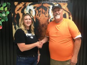 DCHS Principal Bruce Curtis welcomed Danielle Tyson Horton as the new DCHS Tigerette Softball Coach in June