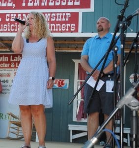 Emily Phillips performs National Anthem during Fiddlers Jamboree Welcome Program Friday