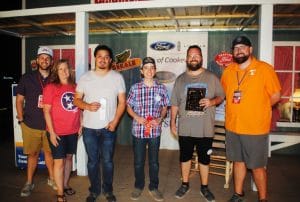 Contest Fiddle (Neil Dudney Memorial Award): First Place- Justin Branum of Murfreesboro (second from right); Second Place-Noah Goebel of Elkton, Kentucky (third from right); and Third Place- Tyler Andal of Nashville (third from left). The Neil Dudney Awards were presented by Dudney’s daughter Janet England (second from left) and two of his grandchildren, Ethan Shaw (far left) and Brandon Shaw (far right).