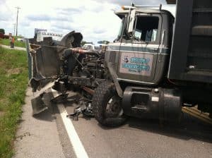 Kathy H. Phillips of Dowelltown was airlifted to Skyline Medical Center after being involved in a crash with a dump truck Wednesday afternoon on Highway 56 near the intersection of Blue Springs Road. Phillips was traveling south in a 2006 Nissan Murano SUV when she crossed the centerline and into the path of a northbound 1993 Mack dump truck, driven by 34-year-old Ryan A. Davis of Monroe, Tennessee of Rhino Trucking who was on a highway work detail for Rogers Group. The truck had no load on it at the time. (Gary Mucha photo)