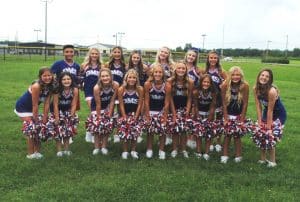 DMS Saints Football Cheerleaders: front row left to right-Baylai Benson,Caitlyn Adcock, Kenna Sykes, Khloe Grandstaff, Sophie Adcock, Lola Colwell, Lakelyn Nelson, Ella Kirksey, Mikayla Troutt. Back row left to right- Landen Tubbs, Leah Trapp, Brylee Kirby, Taylor White, Lillie Young, Madison Johnson, Lillie Williams