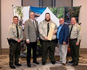 Edgar Evins State Park wins the award for Excellence in Resource Management for Tennessee State Parks. The park tied for the award with Dunbar Cave State Park. In the presentation to Edgar Evins State Park are, from left, Kenneth Gragg, area manager; Greer Tidwell, deputy commissioner, TDEC; Brad Halfacre, park manager; David Salyers, commissioner, TDEC; and Mike Robertson, director of operations for Tennessee State Parks.
