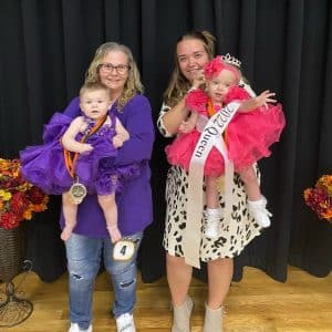 Winner of the Fall Fest Pageant: (girls ages 13-24 months) Renly Kayte Roberts (right) 19 month old daughter of Jordan and Dalton Roberts of Smithville. She also received awards for prettiest smile, eyes, attire and most photogenic. First runner-up: one year old Maeleigh Allen of Smithville (left). She also received the people’s choice award.