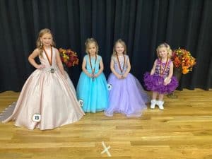 Fall Fest Pageant (ages 4-6) Optionals left to right:  Prettiest Attire-Ansley Grace Snow 6-year-old daughter of Ashleigh Snow and Andy and Laura Snow of Smithville; Prettiest eyes-Briar Rose Kilgore, 4 year old daughter of Clay and Mariah Kilgore of Smithville; Prettiest hair- Brynlee Allana Rankhorn, 4-year-old daughter of Jacob and Ashlee Rankhorn of Rock Island; and Prettiest smile- Jane Grant, 4 year old daughter of Burt and Danielle Grant of Smithville.