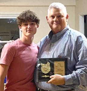 The DeKalb County High School Golf Team had their banquet this week. Ayden Sprague received the Most Improved Award from Head Coach John Pryor