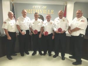 The Smithville Aldermen Monday night approved the promotions of four long time city firefighters upon the recommendation of Chief Charlie Parker including Captain Jeff Wright to Assistant Fire Chief, and Lieutenants John Poss, Donnie Cantrell, and Danny Poss to the rank of Captain. Hoyte Hale will continue serving as Deputy Chief. Pictured left to right are Chief Parker (42 years service), Jeff Wright (35 years service), John Poss (32 years service), Donnie Cantrell (42 years service), Danny Poss (42 years service), and Hoyte Hale (37 years service)