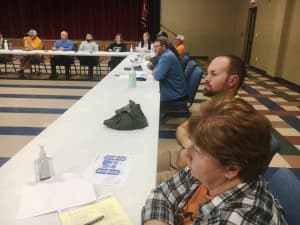 School District employees and members of County Commission Thursday night listen as Architects of Upland Design Group present proposed plan for new Smithville Elementary School