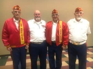 DeKalb Veterans Day Speaker Bill Rutherford with members of the 1377th Bobby Ray Detachment Marine Corps who posted colors during the program. Pictured left to right: Tom Cantrell, Bill Rutherford, Nick Emeric, and John Hummer.