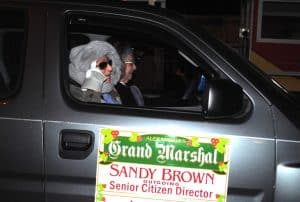 The Grand Marshal was Sandy Brown, outgoing Director of the Alexandria Senior Center. She was accompanied by driver, Alexandria Alderman Lynn Dickerson, who is also recipient of the Presidential Volunteer Lifetime Achievement Award.